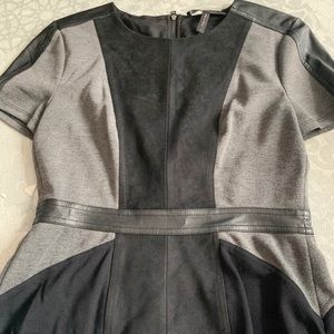 Jersey and suede short sleeve BCBG peplum top